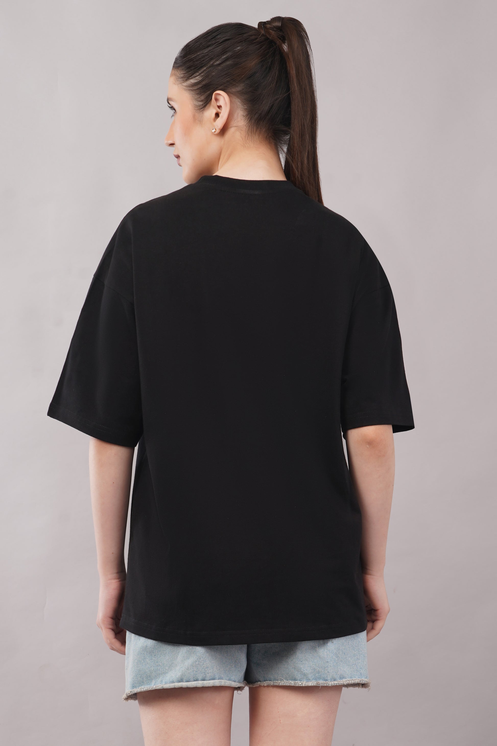 Women's Black Oversized Plain Tee model shot - Corcotton India